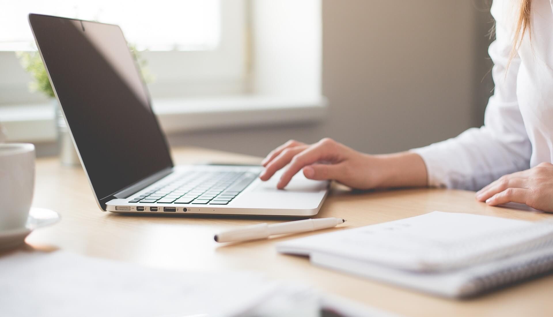 Woman working on laptop - Focal Point Bookkeeping